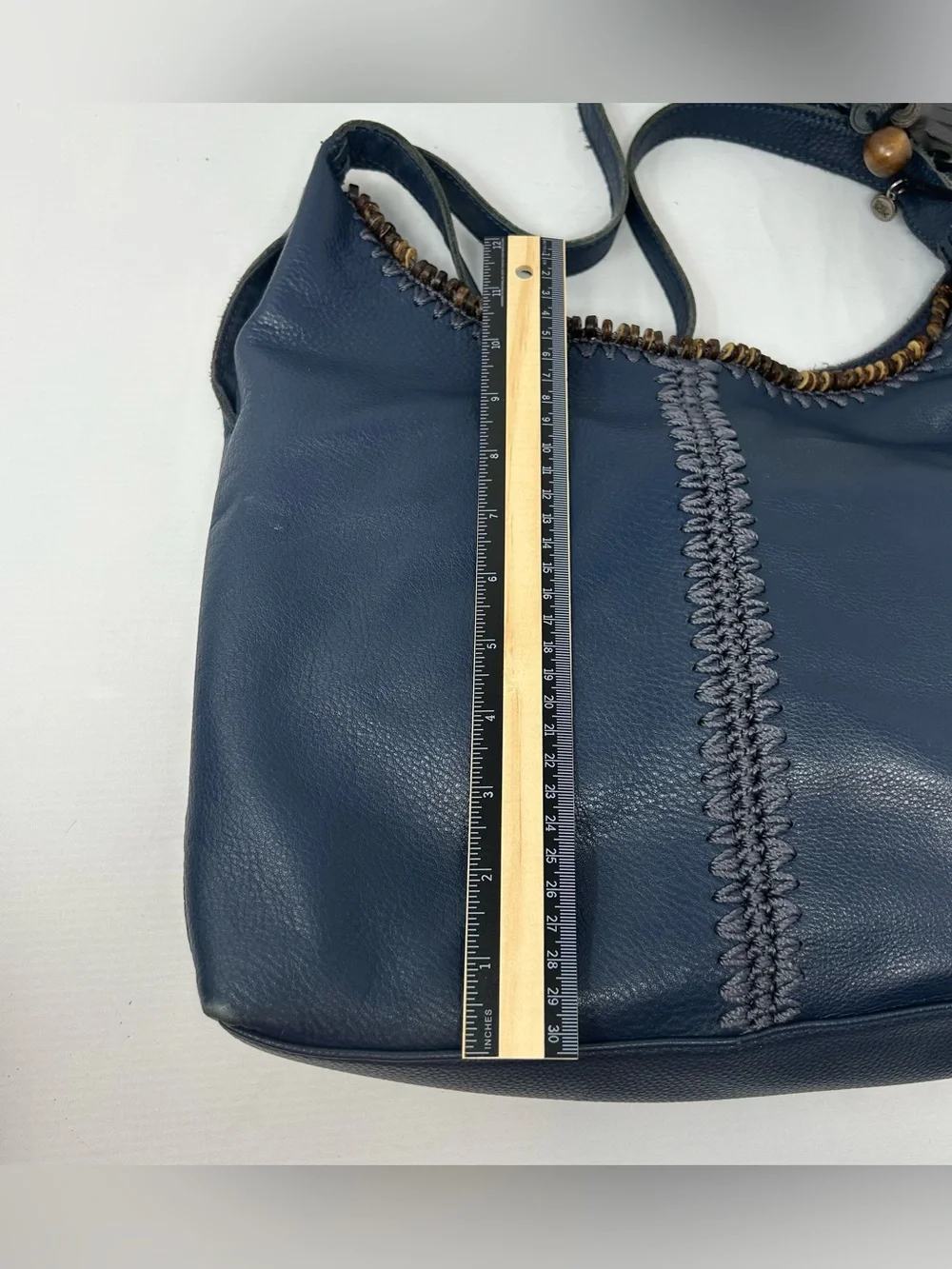 The Sak Boho Leather Hobo Bag slouchy with Beaded Trim and Tassel charm Blue